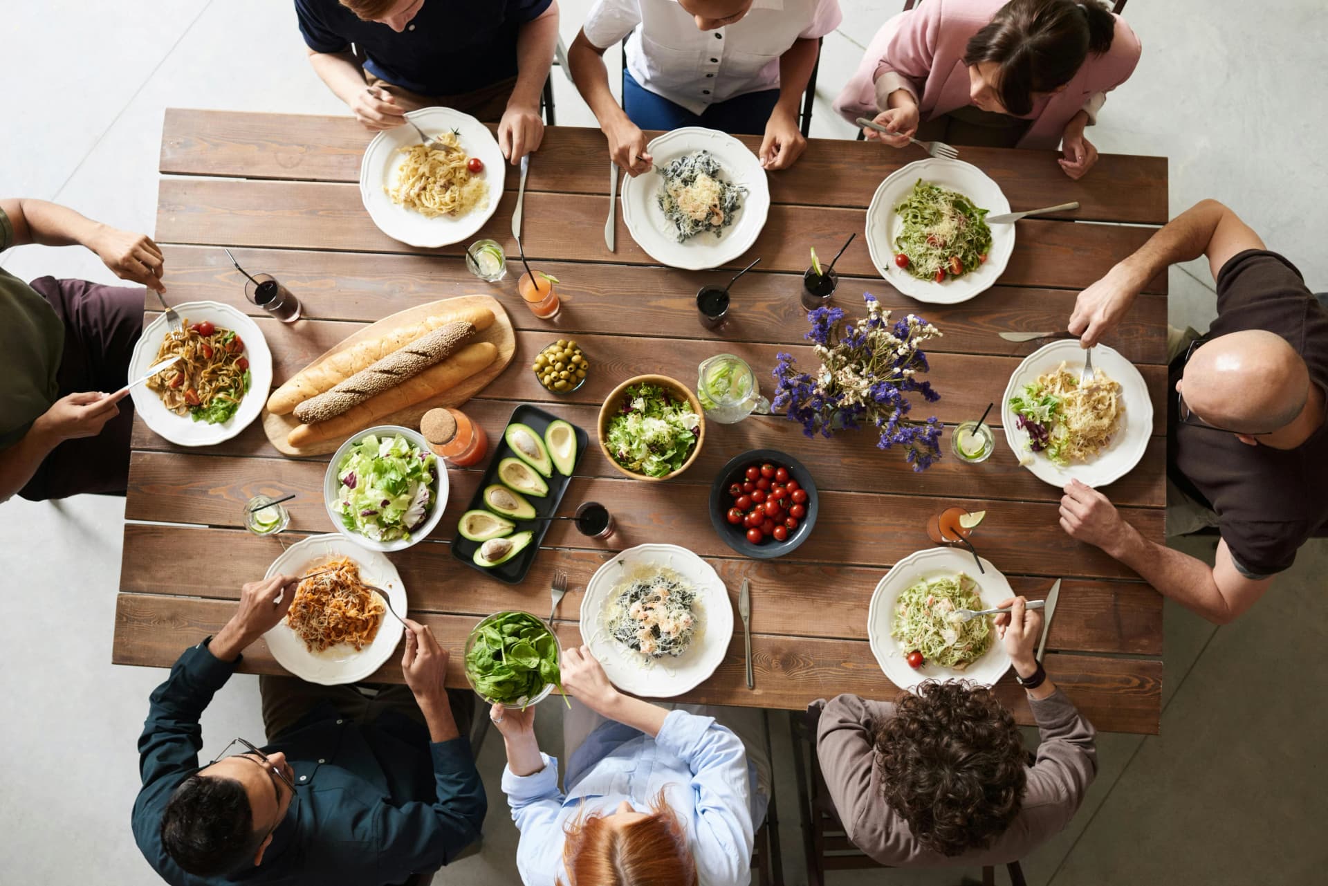 People gathering and dining at restaurant